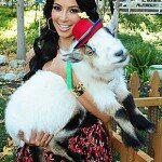 Kim Kardashian hugs a goat